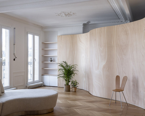 toledano + architects adds curved wooden 'ribbon' to haussmanian apartment in paris