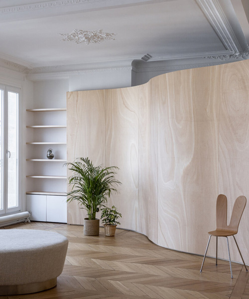 toledano + architects adds curved wooden 'ribbon' to haussmanian apartment in paris