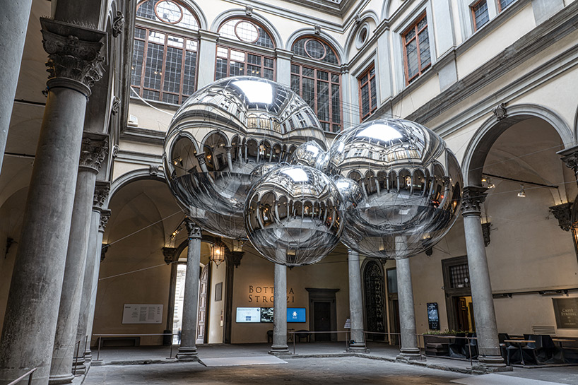 tomás saraceno brings illuminated spiderwebs, reflective spheres and more to palazzo strozzi