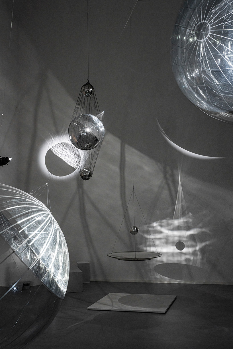 tomás saraceno brings illuminated spiderwebs, reflective spheres and more to palazzo strozzi