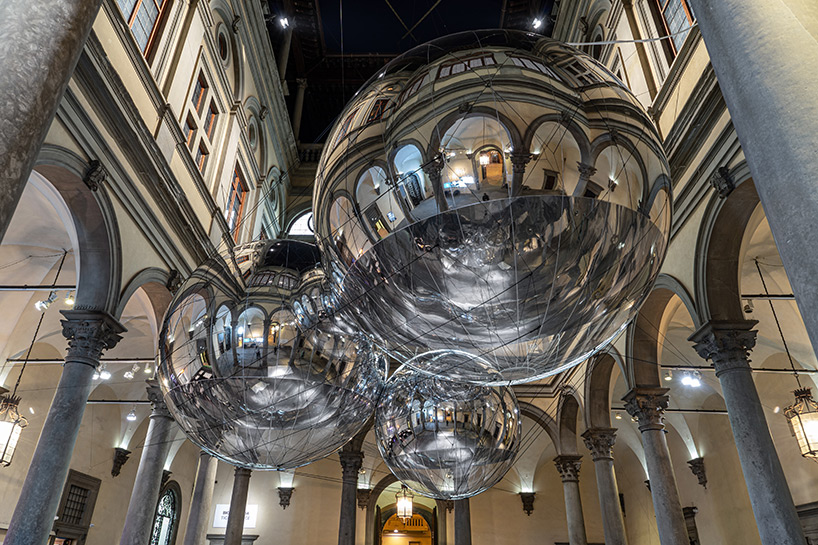 tomás saraceno brings illuminated spiderwebs, reflective spheres and more to palazzo strozzi