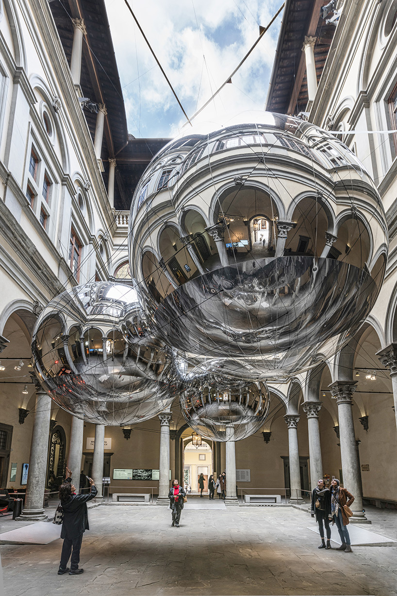 tomás saraceno brings illuminated spiderwebs, reflective spheres and more to palazzo strozzi