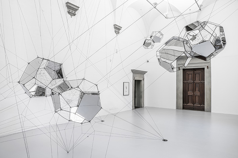 tomás saraceno brings illuminated spiderwebs, reflective spheres and more to palazzo strozzi