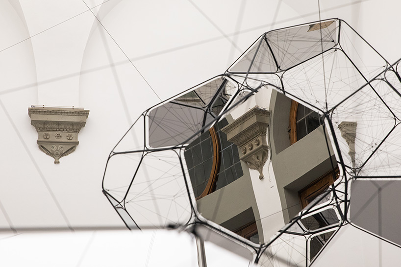 tomás saraceno brings illuminated spiderwebs, reflective spheres and more to palazzo strozzi