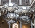 tomás saraceno brings illuminated spiderwebs, reflective spheres and more to palazzo strozzi