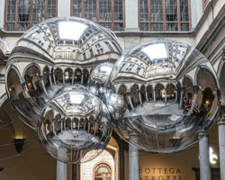tomás saraceno brings illuminated spiderwebs, reflective spheres and more to palazzo strozzi