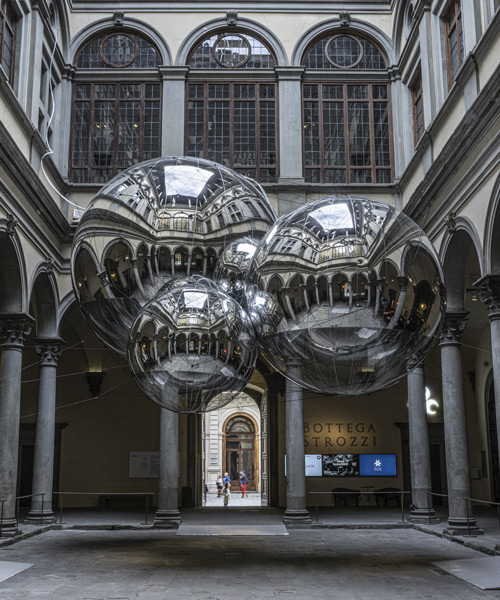 tomás saraceno brings illuminated spiderwebs, reflective spheres and more to palazzo strozzi