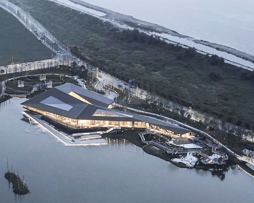 XAA's lakeside academy appears to float on water in meishan city, china