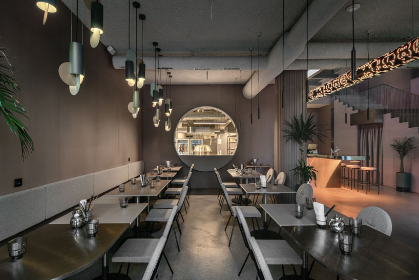 YOD group decorates new york restaurant interior with 4.5-meter-tall  glass-hewn buddha sculpture
