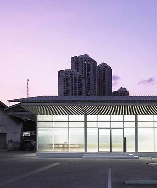 ASWA uses rippled glass to convert a former warehouse into a new office in bangkok