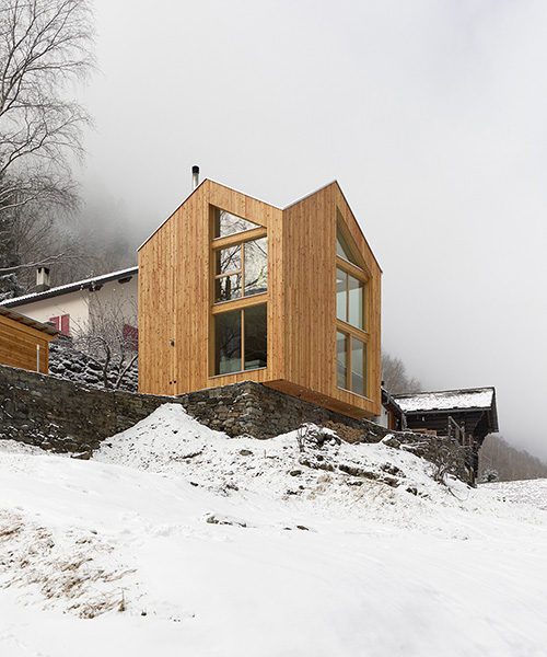 timber clads interior and exterior of davide macullo architect's swisshouse XXXV