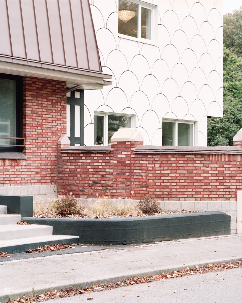 d'houndt + bajart extends an 'eccentric' french villa into eight social housing units