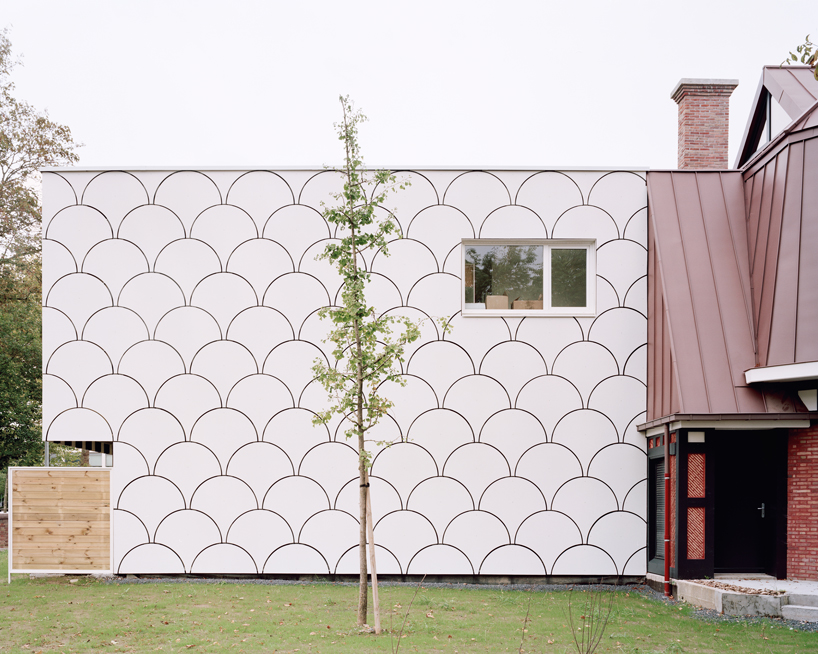 d'houndt + bajart extends an 'eccentric' french villa into eight social housing units