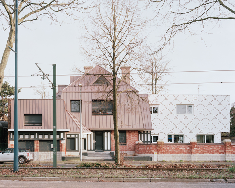 d'houndt + bajart extends an 'eccentric' french villa into eight social housing units