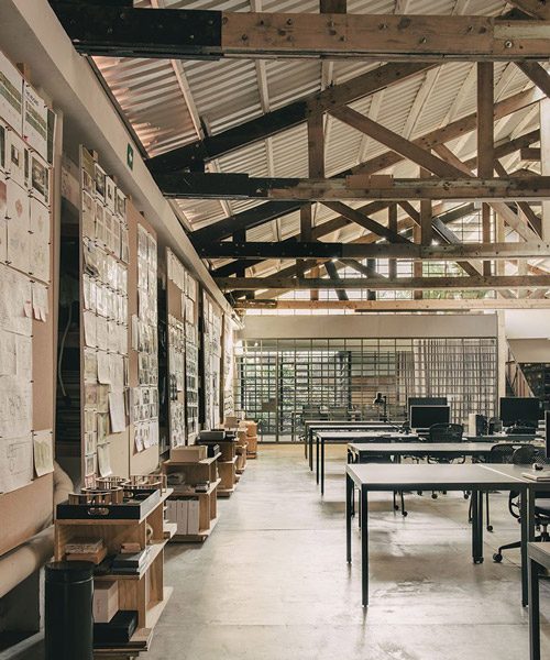 esrawe studio refurbishes 1950s warehouse into its own spacious atelier in mexico city