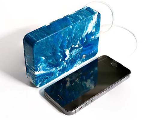gomi creates a portable charger made from 100% non-recyclable plastic waste