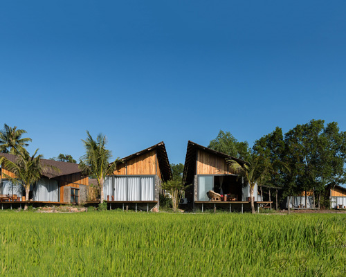 H2 uses local materials to build the ruong resort within a rice field in rural vietnam