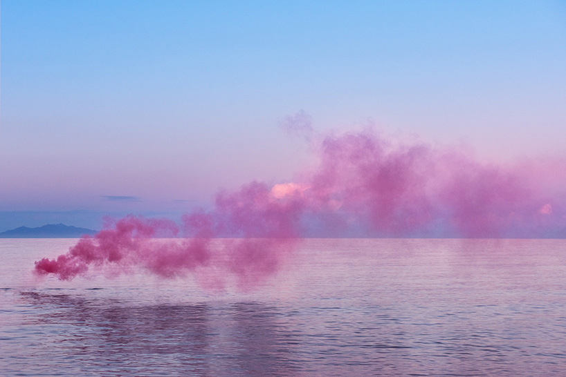 isabelle & alexis explode color bombs to create ephemeral and vivid scenes