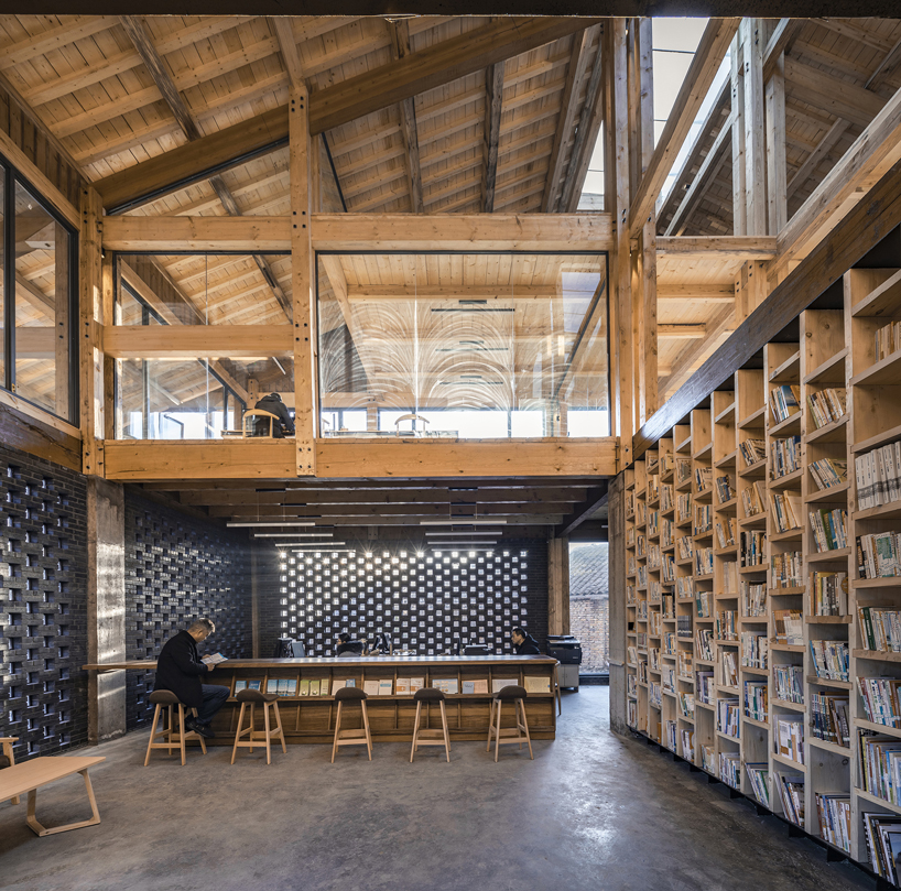 LUO studio uses a prefabricated timber structure to build community center in rural china designboom