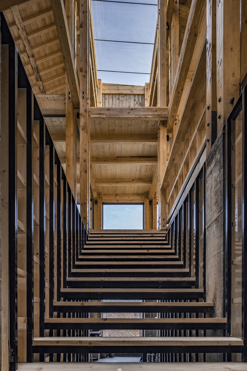 LUO studio uses a prefabricated timber structure to build community center in rural china designboom