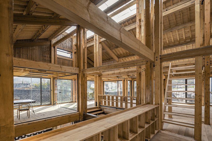 LUO studio uses a prefabricated timber structure to build community center in rural china designboom