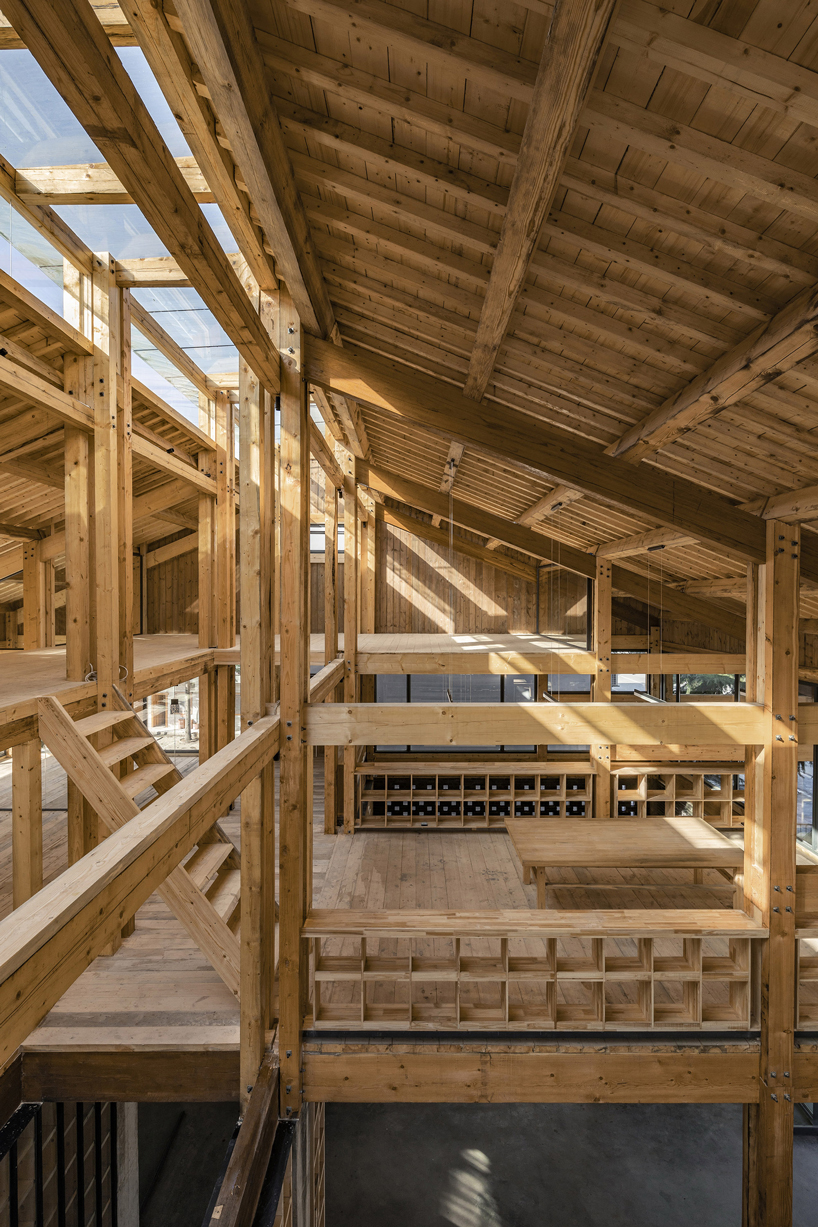 LUO studio uses a prefabricated timber structure to build community center in rural china designboom