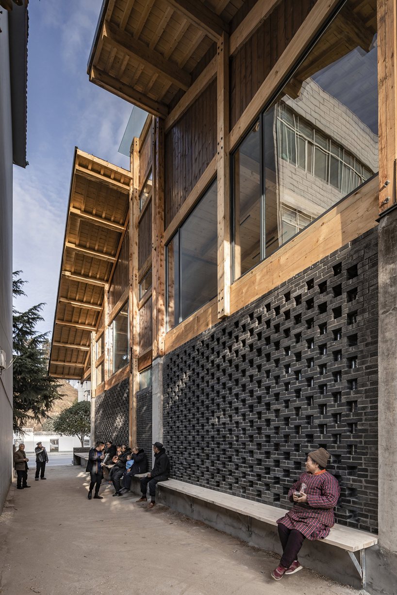 LUO studio uses a prefabricated timber structure to build community center in rural china designboom