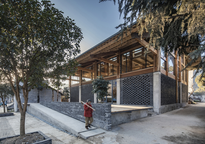 LUO studio uses a prefabricated timber structure to build community center in rural china designboom