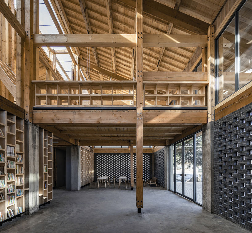 LUO studio uses a prefabricated timber structure to build community center in rural china designboom