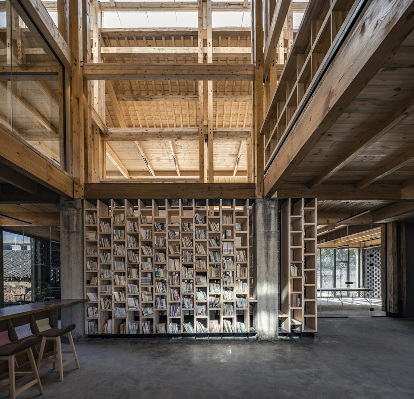 LUO studio uses a prefabricated timber structure to build community center in rural china designboom