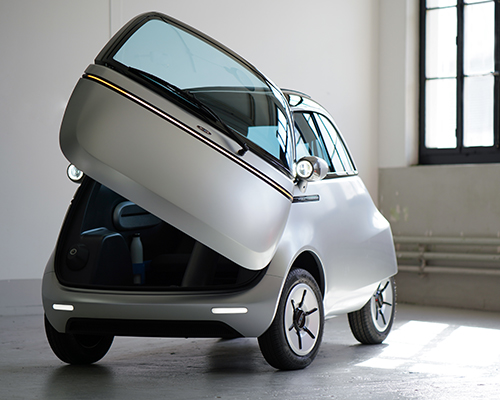 small, electric microlino car soon to be driving along european streets