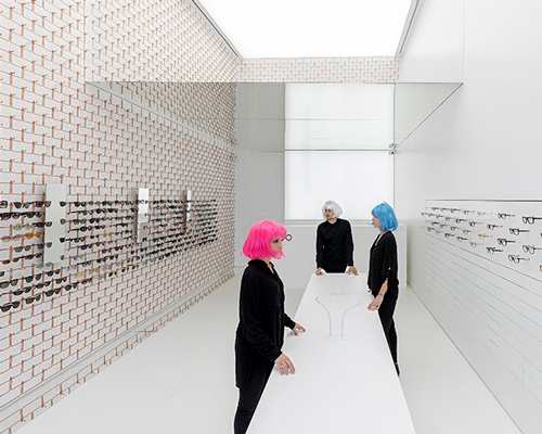 mold architects installs a metal curtain wall to display sunglasses in athens eyewear store