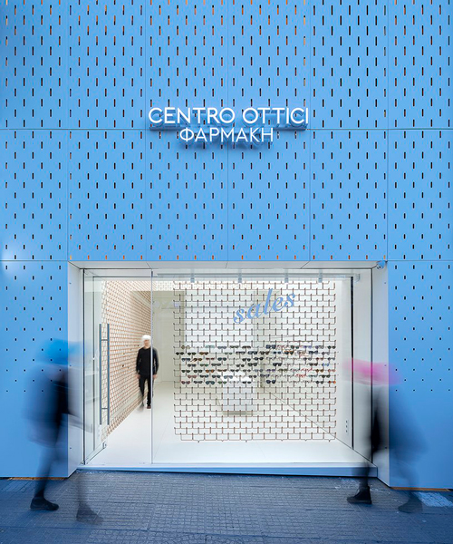mold architects installs a metal curtain wall to display sunglasses in athens eyewear store