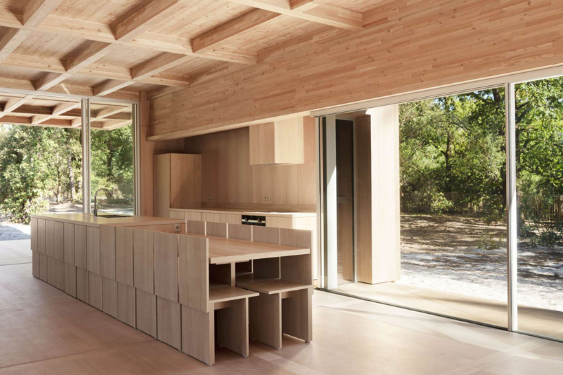 nicolas dahan constructs wooden family house within pine forest in ...