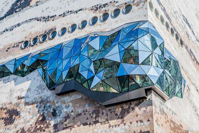 OMA's galleria in gwanggyo with mosaic stone façade is realized in korea designboom