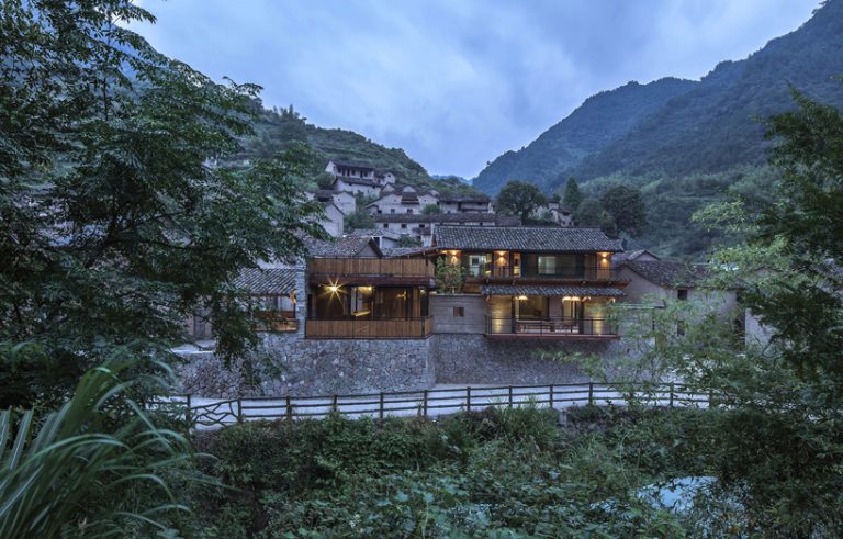 shulin architectural design sets stone + wood hotel within an ancient ...