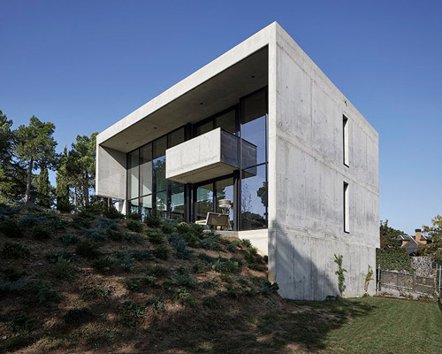 rob dubois articulates barcelona residence in heavy concrete and glass