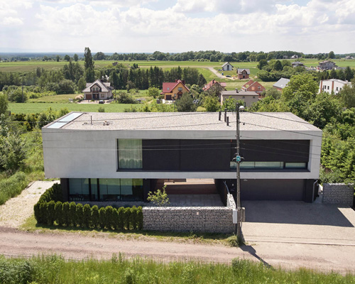 rs+ robert skitek combines three blocks into his own family's house in poland
