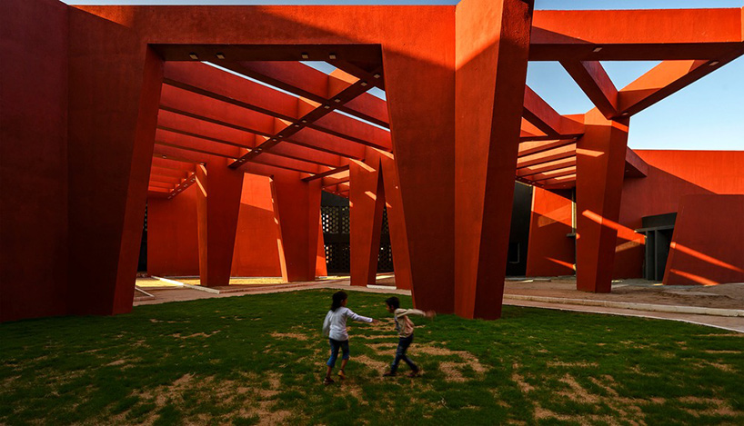 sanjay puri shades school campus in northern india with a network of angled red walls