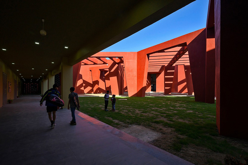 sanjay puri shades school campus in northern india with a network of angled red walls