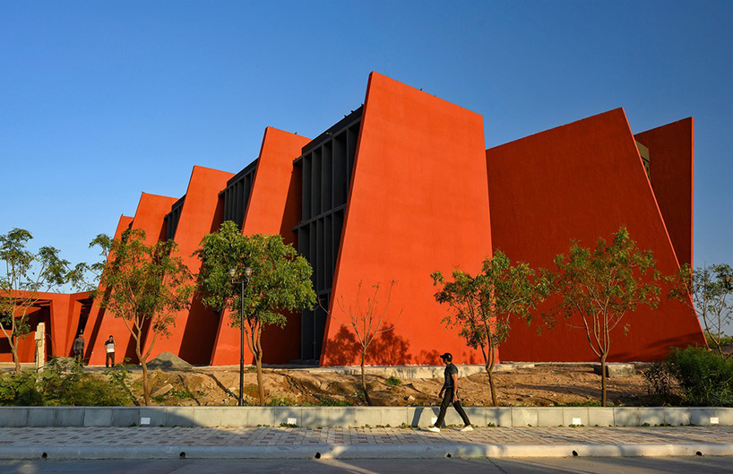 sanjay puri shades school campus in northern india with a network of angled red walls