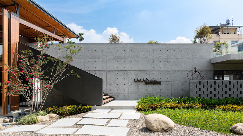 studiobase architects adds laminated wood façade to restaurant in taiwan