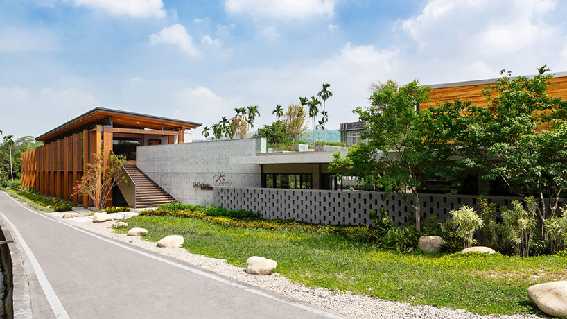 studiobase architects adds laminated wood façade to restaurant in taiwan