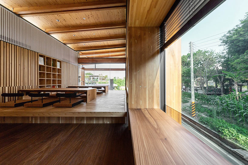 studiobase architects adds laminated wood façade to restaurant in taiwan