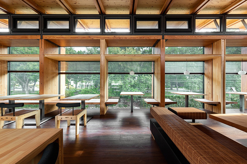 studiobase architects adds laminated wood façade to restaurant in taiwan