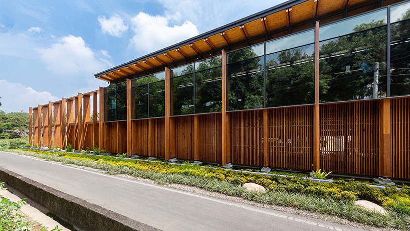 studiobase architects adds laminated wood façade to restaurant in taiwan