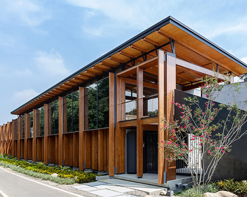 studiobase architects adds laminated wood façade to restaurant in taiwan