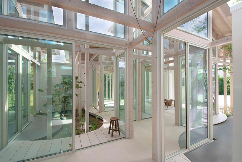 studio velocity hides japanese 'house on the hedge' behind green barriers