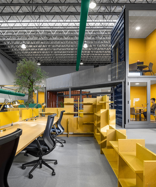 studium occupies vast, underground warehouse in porto with 'spectris' creative workspace