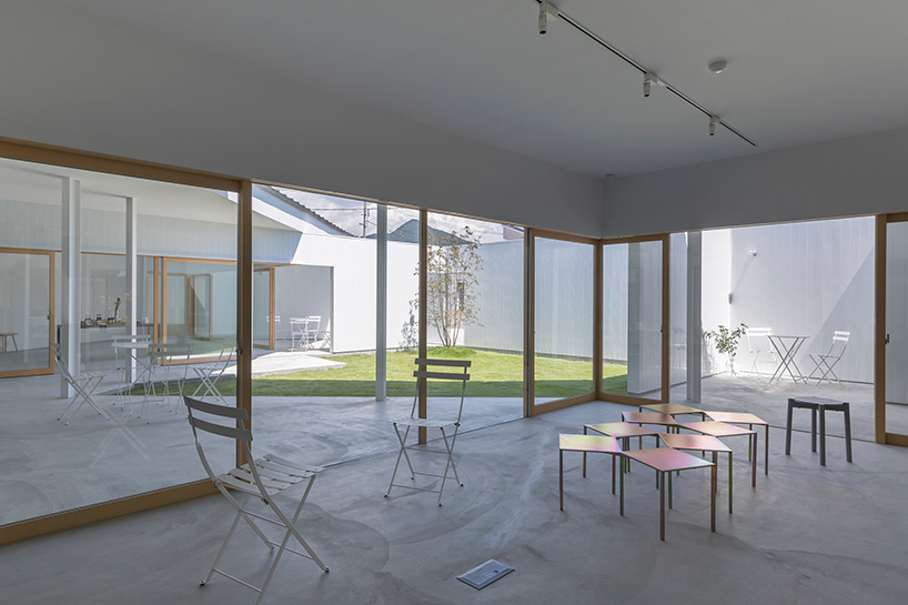 tato architects organizes house and office in japan with angled walls and internal courtyards